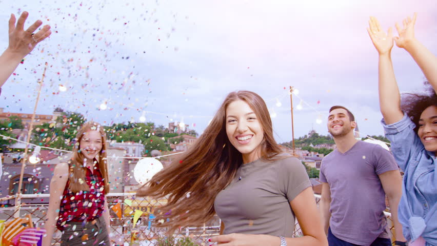 Bautiful Young Female Walking Through Confetti Fall As People Cheer And Celebrate Jumping And Laughing Happy Party Trick Birthday Celebration During Golden Hour Shot on Red Epic W 8K Slow Motion