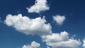 White fluffy clouds against the blue sky. Full HD 1920x1080 Video Clip