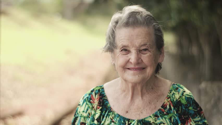 Joyful senior lady in glasses laughing | Shutterstock HD Video #30029380