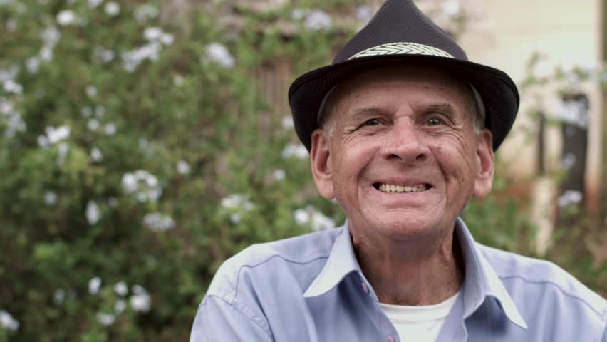 Smiling elderly man looking at camera | Shutterstock HD Video #30029392