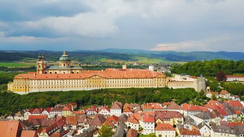 Melk Abbey Monastery aerial panoramic view. Stift Melk is a Benedictine abbey in Melk, Austria. Monastery located on a rocky outcrop overlooking the Danube river and Wachau valley.