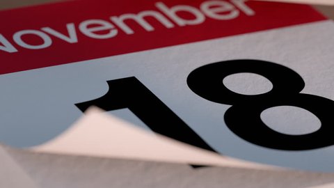 Paper tear off desk Calendar for November flipping through days of month