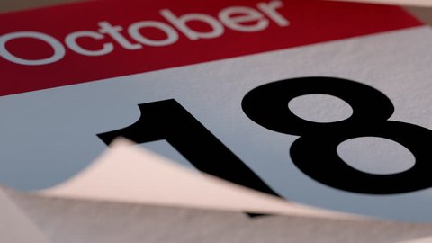 Paper tear off desk Calendar for October flipping through days of month