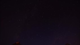 Panorama of the night. The movement of stars in the sky.