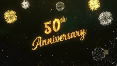 50th Anniversary Greeting Text Made from Sparklers Light Dark Night Sky With Colorfull Firework.