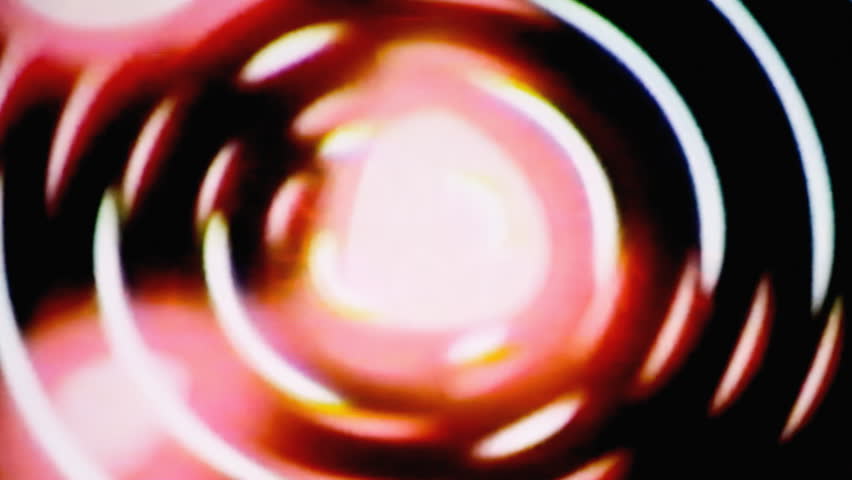 Vhs real projection: the text Our feature presentation appears over a set of spinning circles with a lens flare at the beginning. Grindhouse low-budget b-movie style.
 Royalty-Free Stock Footage #30066340