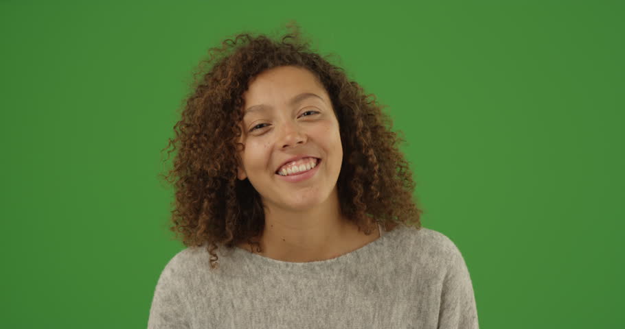 Happy smiling young multi ethnic millennial woman talking over video chat conference call on green screen. On green screen to be keyed or composited. Royalty-Free Stock Footage #30068965