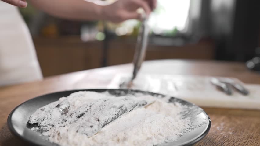 fish-floundered-flour-frying-boiling-oil-stock-footage-video-100