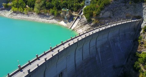 AERIAL: Cinematic view of Fiastra lake dam. Marche Region, Italy. 