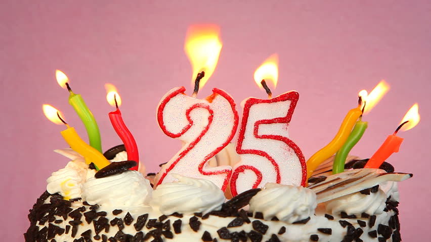 Happy 25 birthday cake and candles on pink background