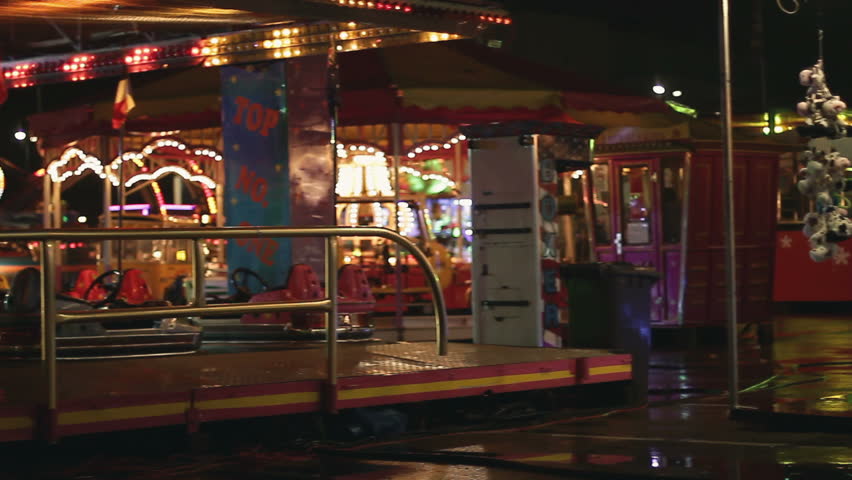 Bumper cars in amusement park at night