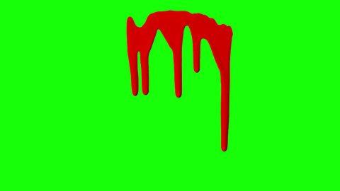 Red ink dripping over green screen background. Close-up shot