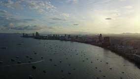 4K Aerial view of Pattaya city and sea with morning sunrise