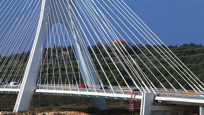 Car on bridge with pylon in Portugal, Europe
