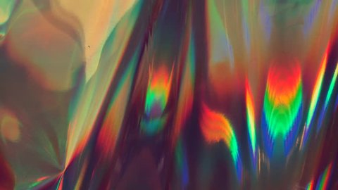 Neon holographic Iridescent foil. Multicolor surface and shiny background with waves.  Live wallpaper loop. Moving multi-color light – Video có sẵn
