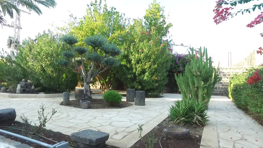 Walking By a Garden in Jerusalem.