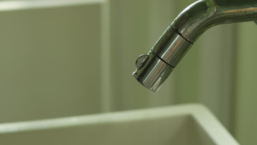Man hand open a water tap for washing hands then turn water off in a public toilet. | Shutterstock HD Video #30134509