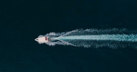 Slow Motion Aerial Drone Shot Over Small Speed Boat Boat Rushing Toward Exotic Caribbean Destination Jamaica Scenic Seascape Traveling To New Destinations Caribbean Vacation Holiday Concept 4k