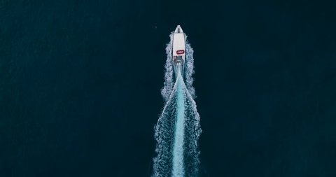 Slow Motion Aerial Drone Shot Over Speed Boat Passing Through Beautiful Blue Ocean Tropical Destination Jamaica Traveling To New Destinations Summer Vacation Concept 4k