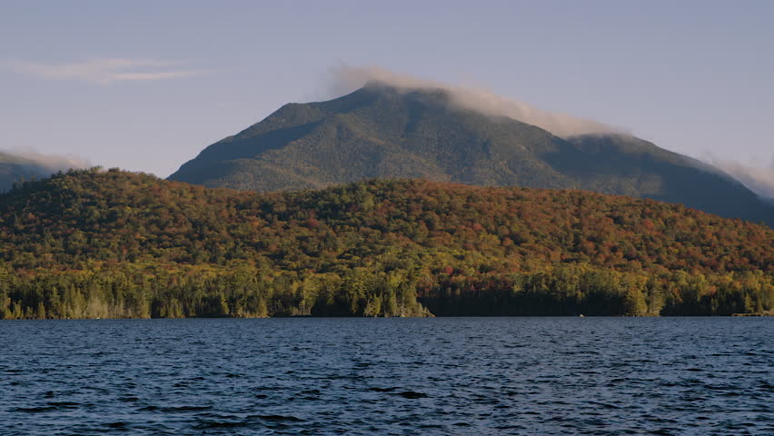 Misty Adirondack mountaintop during sunrise.