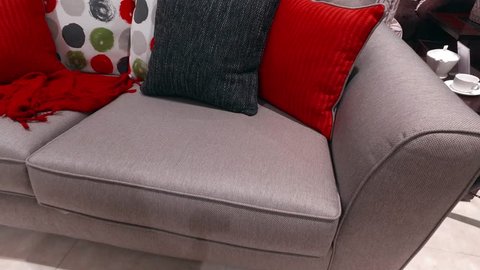 Gray sofa with bright pillows