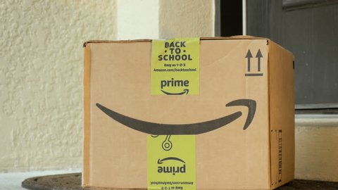 NEW YORK - AUG 24: Amazon Prime box package delivery on August 24, 2017. As of April 2017, Amazon Prime has more than 80 million paying users.
