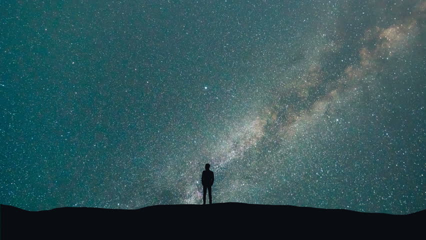 The man stand on a background of a milky way with asteroids skyfall. time lapse | Shutterstock HD Video #30148867