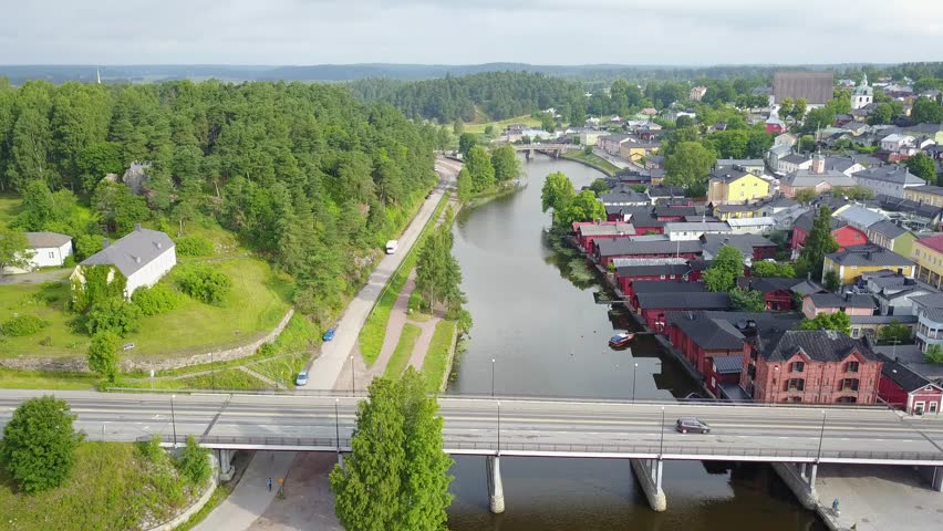 4K aerial video footage view of medieval Porvoo old town on river Porvoonjoki, cathedral, river embankment, boats, old warehouses and area 50 km east of Helsinki, capital of Finland in northern Europe | Shutterstock HD Video #30158593