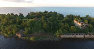 4K aerial video footage view of St. Petersburg sea dam circle highway and old abandoned military forts on small islands near St. Petersburg 700 km from Moscow, Russia on clear summer morning