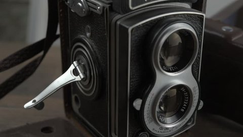 vintage camera with dual lens panning shot
