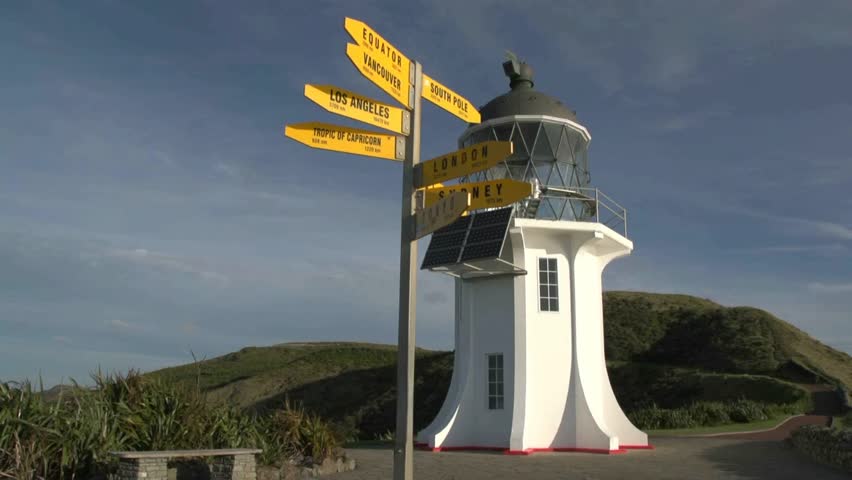 CAPE REINGA, NEW ZEALAND. NOVEMBER 2012. Signpost showing distances to various