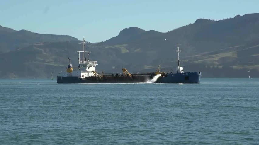 Otago Harbour, New Zealand, May 2012 -  Ship dredging the main shipping channel
