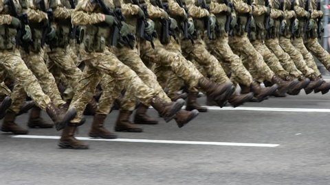 Military parade in the city. March of soldiers