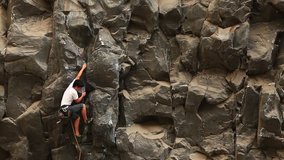 Rock climbing on a ideal vertical wall.