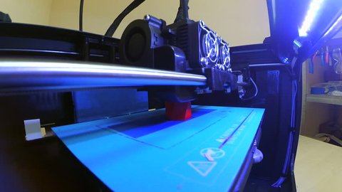 Printing a 3d printer view from the inside in lab action camera go pro. Modern additive technologies 4.0 industrial revolution