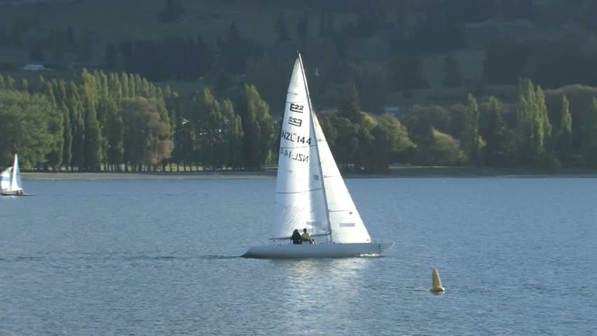 WANAK, NEW ZEALAND - CIRCA JULY 2011: A relaxing clear day watching yachts on