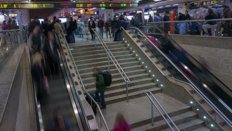 ROME - NOVEMBER 01: (TIME-LAPSE) Crowds of people using escalators at Rome's train station on November 01, 2012 in Rome, Italy. Roma Termini (Stazione Termini) is the main railway station of Rome.