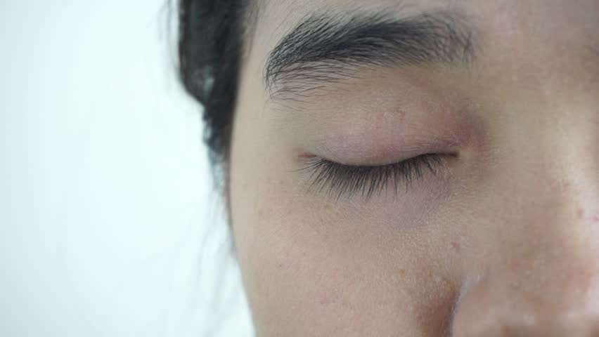 Closeup eye beautiful young woman asian white background | Shutterstock HD Video #30216406