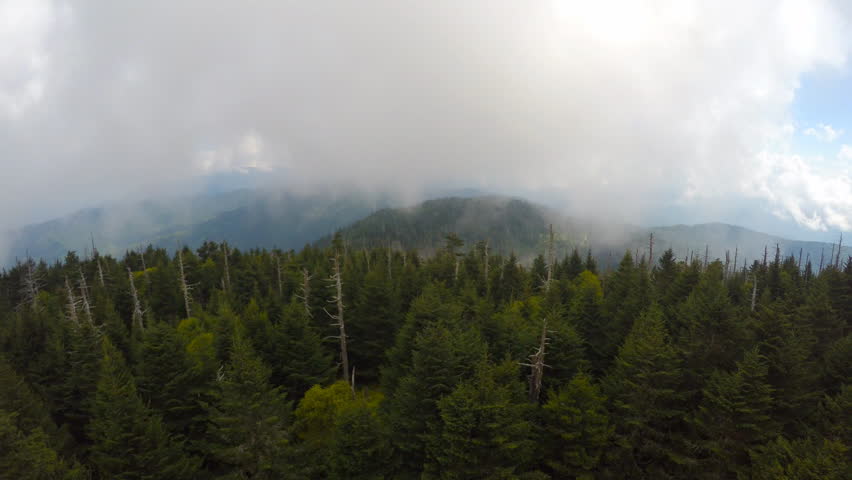 Dramatic clouds, mist and fog sweeping around the mountain ranges, valleys and peaks in Great Smoky Mountains National Park, view from the tallest peak, Clingman