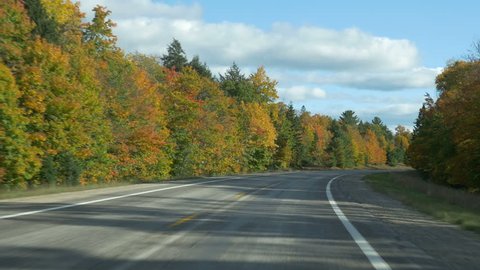 Driving POV in Autumn on M-77 (Michigan state route 77) in  Alger County, Upper Peninsula, Michigan.
