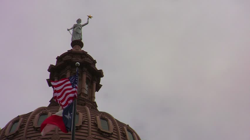 Top of the Texas State Capitol Building on a cloudy and windy day