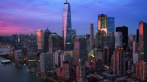 Lower Manhattan skyline, Famous skyscrapers during sunset in the Financial District of New York City. United States, North America. Shot from helicopter.