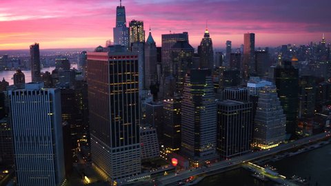 Lower Manhattan skyline, Famous skyscrapers during sunset in the Financial District of New York City. United States, North America. Shot from helicopter. Video Stok