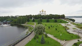 4K aerial video footage view of Russia's largest river Volga, Yaroslavl strelka peninsula with park and cathedral view, its shores in Yaroslavl Oblast area, 260 km north-east of Moscow, central Russia