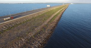 4K aerial video footage view of St. Petersburg sea dam circle highway and old abandoned military forts on small islands near St. Petersburg 700 km from Moscow, Russia on clear summer morning