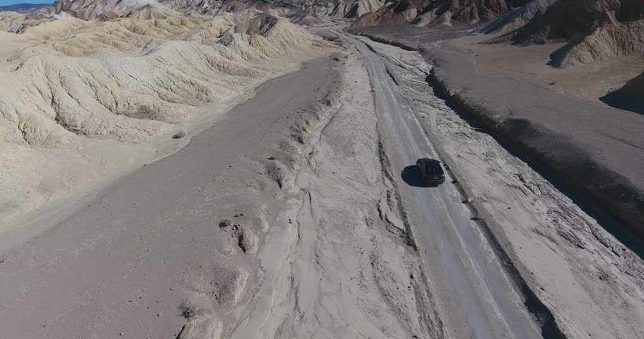 Following A Car In The Canyons Of Death Valley Drone View