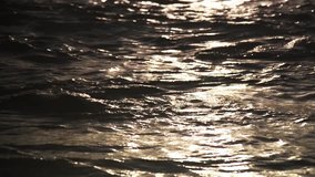 Motion of water splash in the sea with sunlight in shadow with twilight, Abstract background pattern