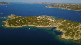 Aerial video of Porto Pollo in Sardinian coastline. This place is popular for surfing.