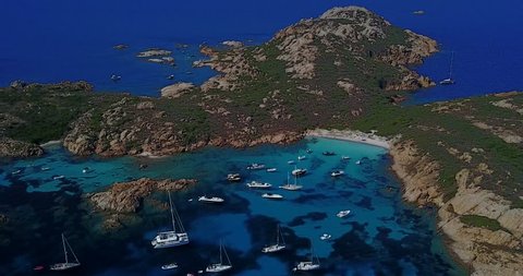 Aerial video of Isola Di Mortorio in Costa Smeralda, Sardinia, in the middle of summer.