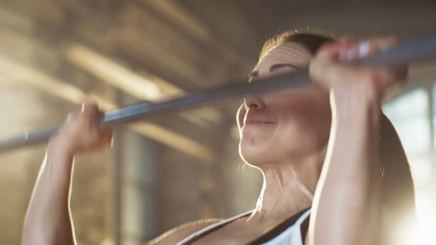 Beautiful Athletic Woman Wipes Sweat from Her Forehead with a Hand. She's Tired after Intensive Fitness Exercise. Shot on RED EPIC-W 8K Helium Cinema Camera. Royalty-Free Stock Footage #30308449